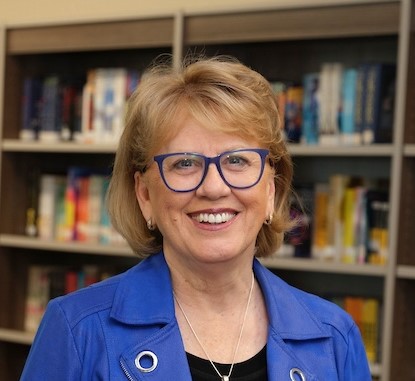 Judy Headshot-blue jacket library 2024 - Judy Schwiebert